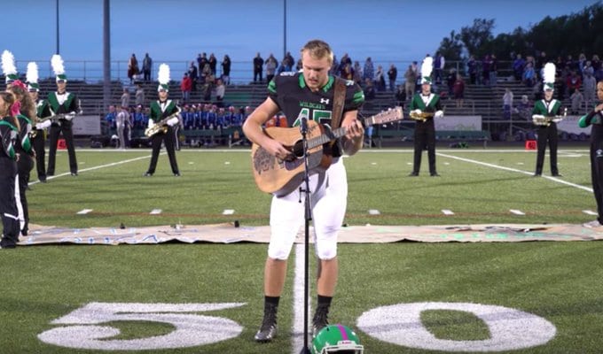 WATCH: High School Football Star Jackson Dean Gave National Anthem a Country Spin 1