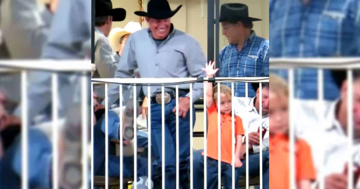 George Strait Smiles While Watching Grandson Place Bid At Auction In 2017