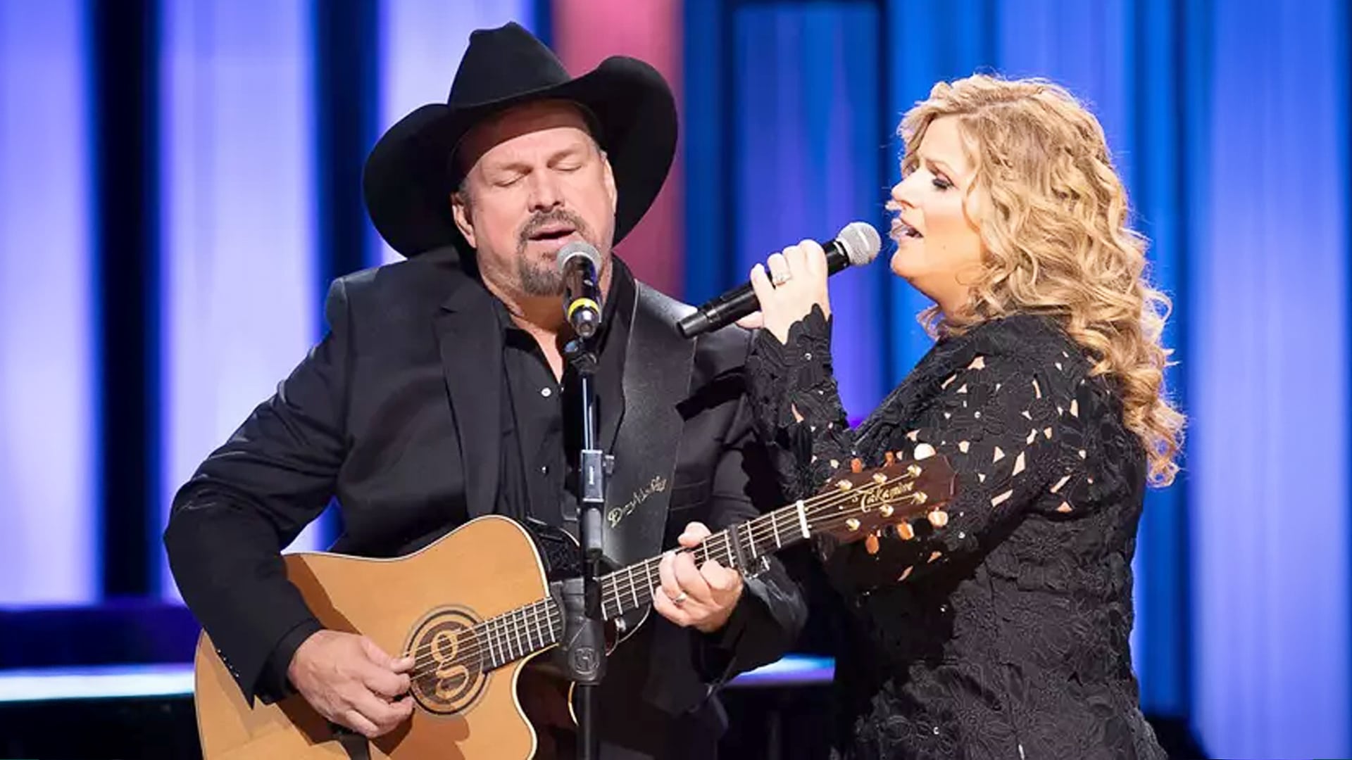 Garth Brooks and Trisha Yearwood honored George and Tammy at Opry 100 with a heartfelt tribute that captured the timeless soul of classic country.