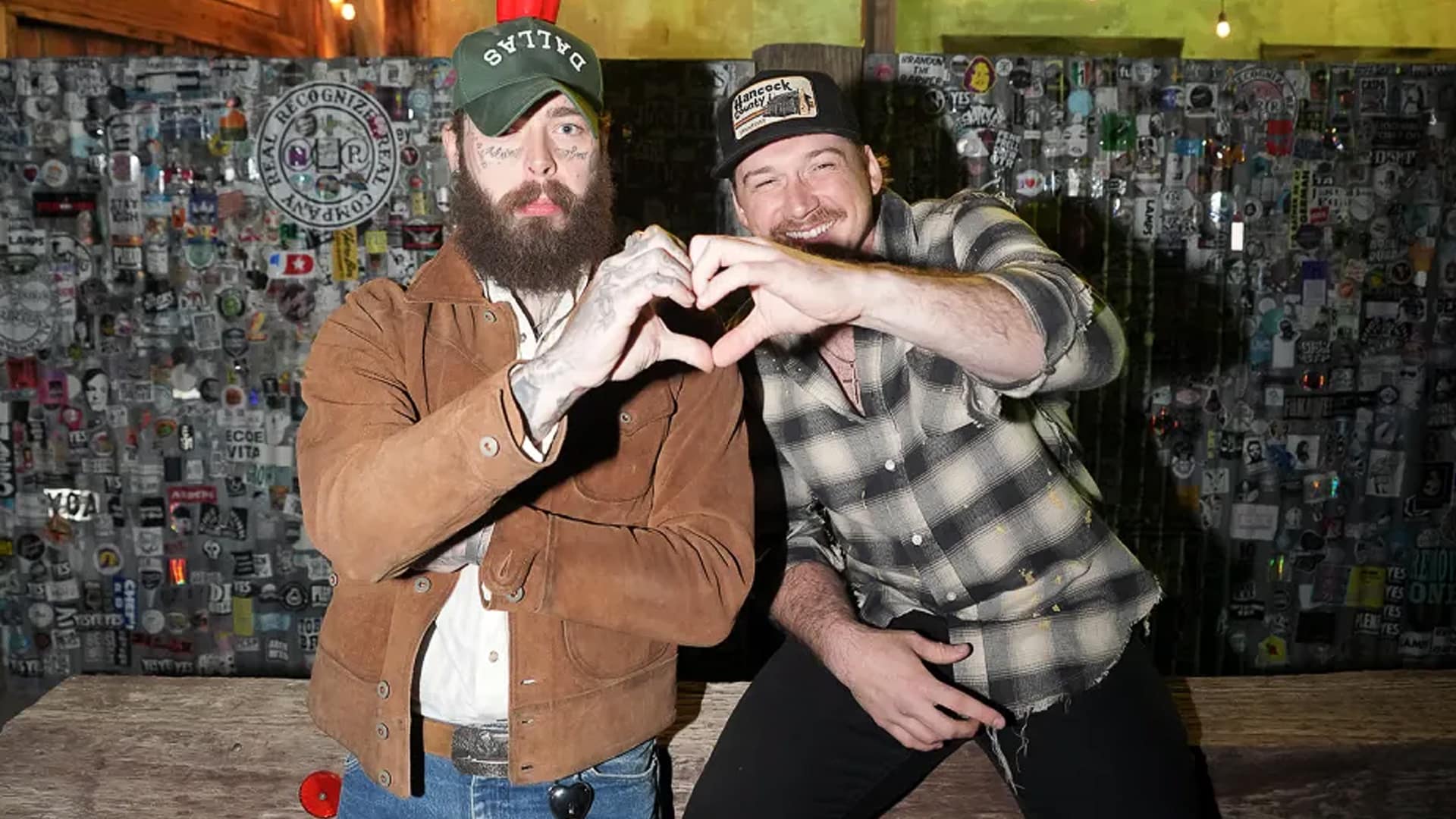 Morgan Wallen and Post Malone pose playfully after releasing their new single "I Ain’t Comin’ Back," continuing their chart-dominating country-pop chemistry.