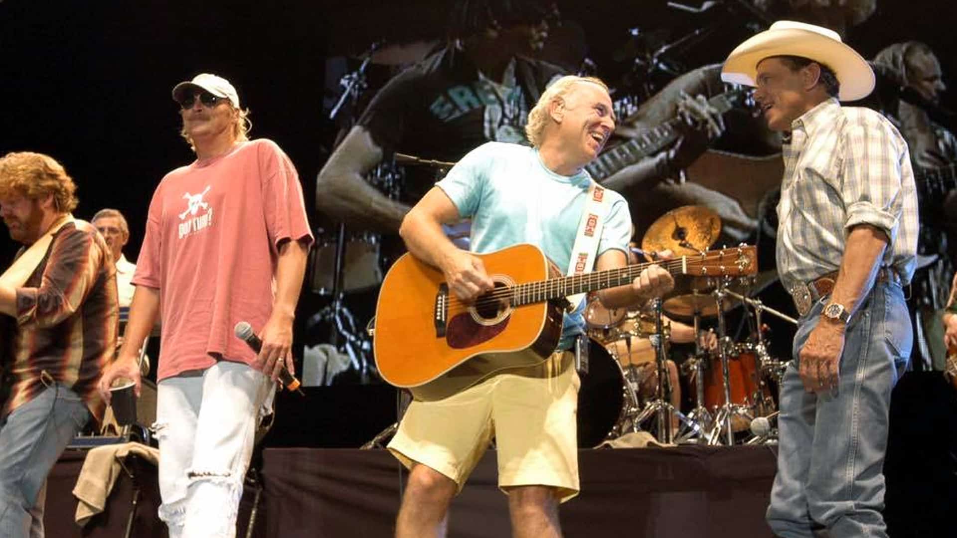 George Strait, Alan Jackson, and Jimmy Buffett light up the stage with a legendary "Margaritaville" performance that became a timeless Texas moment.
