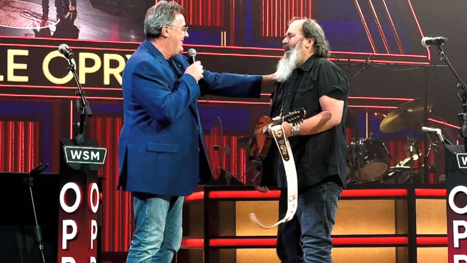 Vince Gill surprises Steve Earle with an emotional Grand Ole Opry invitation during a live set after performing "Copperhead Road."