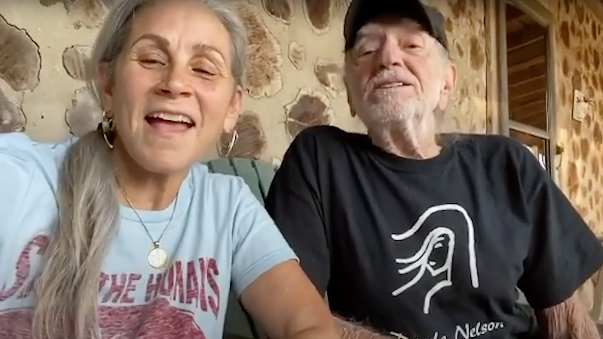 Willie Nelson and his wife Annie D'Angelo appear smiling together, shortly after Annie slammed false claims about their son Lukas caring for them.