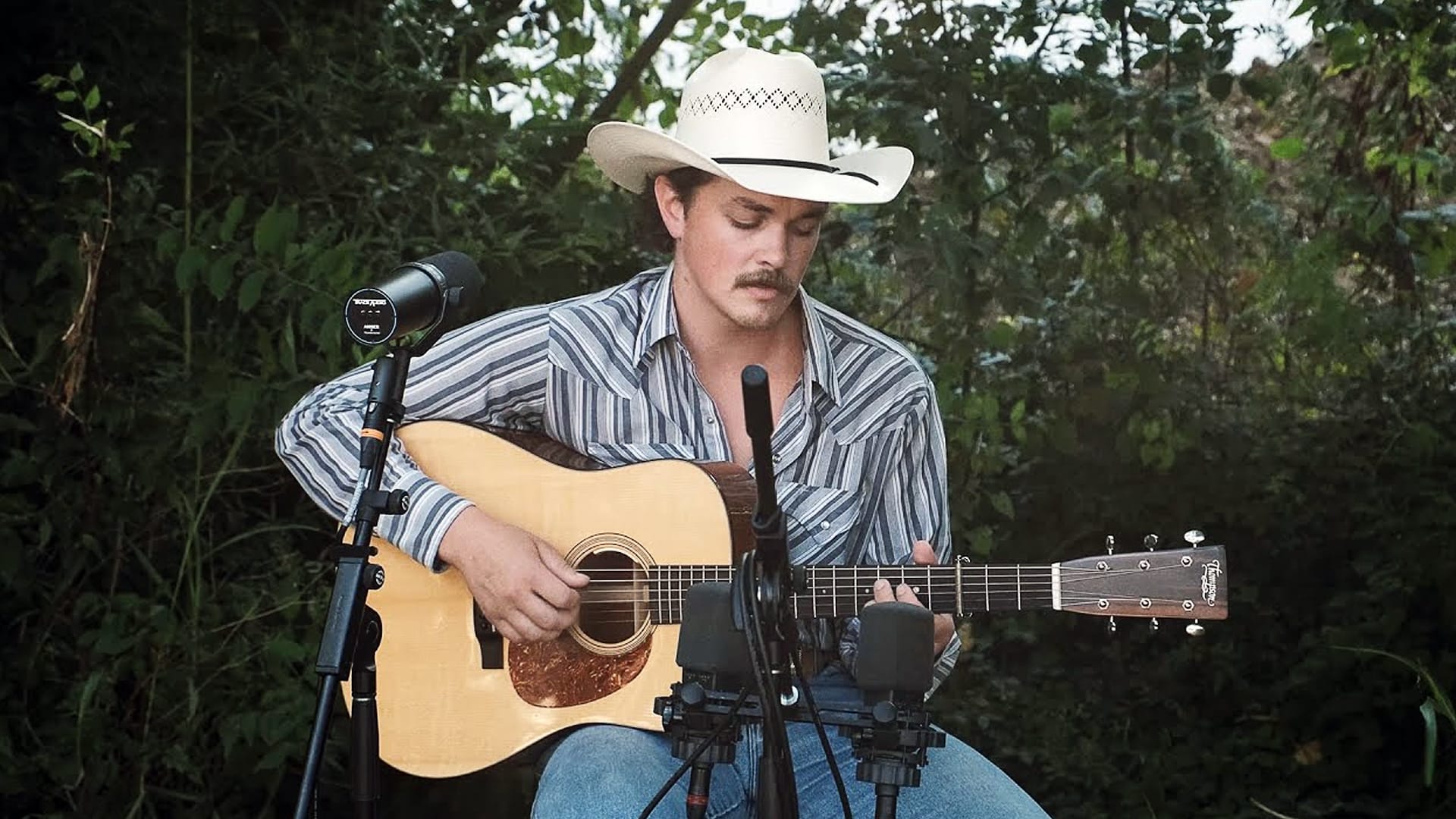 Zach Top performs an acoustic set in the woods, delivering the kind of raw, honest country music he says fans are starving for.
