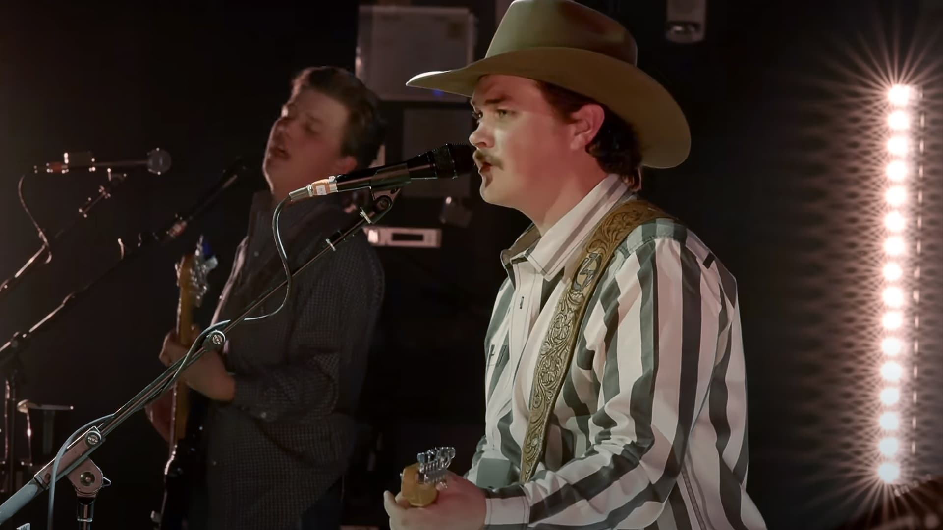 Zach Top performs at the Ryman Auditorium, delivering a heartfelt debut that honors traditional country roots with raw, authentic energy and undeniable talent.