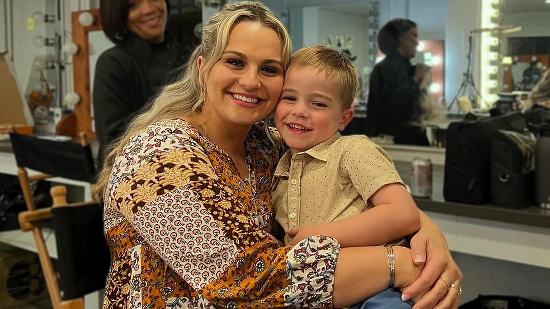 Breanna Nix hugs her young son backstage as she prepares for her Grand Ole Opry debut, radiating joy ahead of her biggest country music milestone yet.