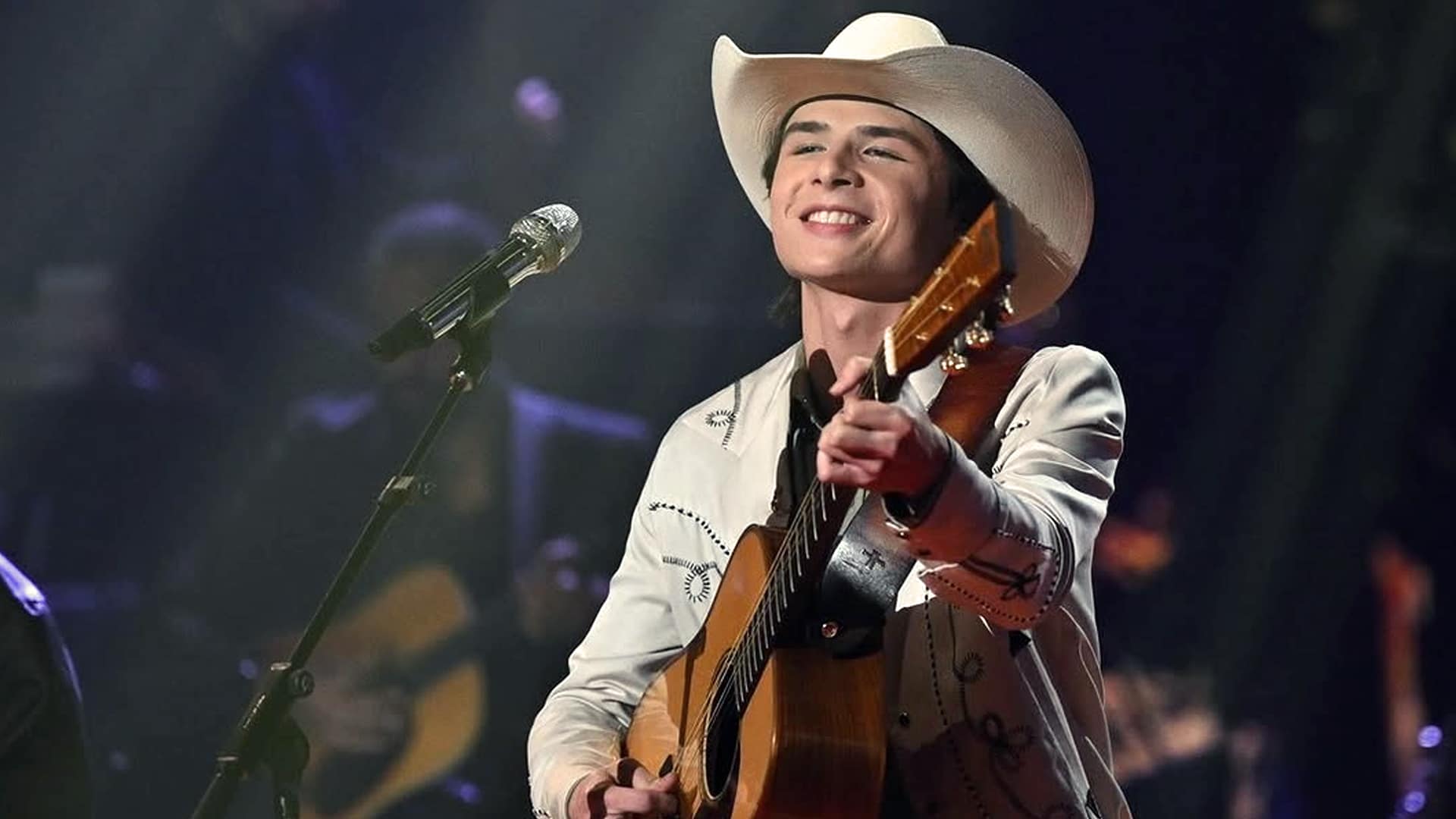 American Idol runner-up John Foster performs with a smile, later breaking his silence about the finale results and clearing up fan speculation.