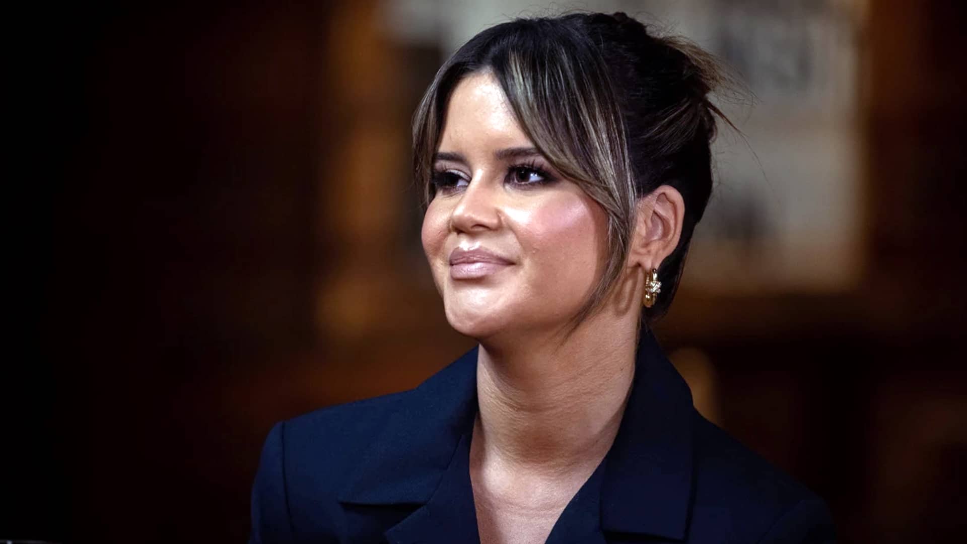 Maren Morris appears in a recent interview, attempting to clarify her stance on country music after previously signaling a departure from the genre.