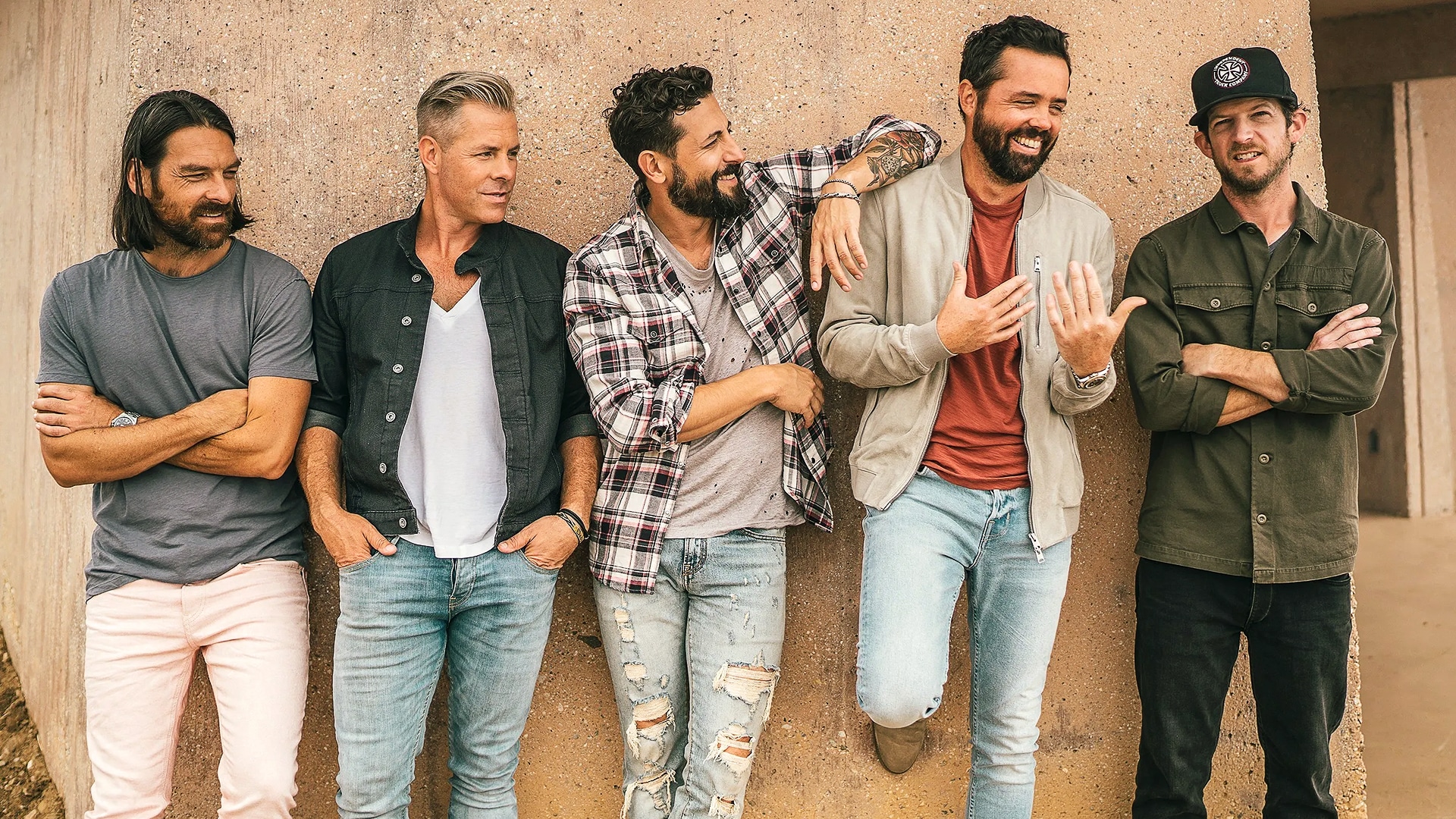 Old Dominion captured here in a past promo photo, just before breaking Rascal Flatts’ record with their eighth straight Group of the Year win at the 2025 ACM Awards.