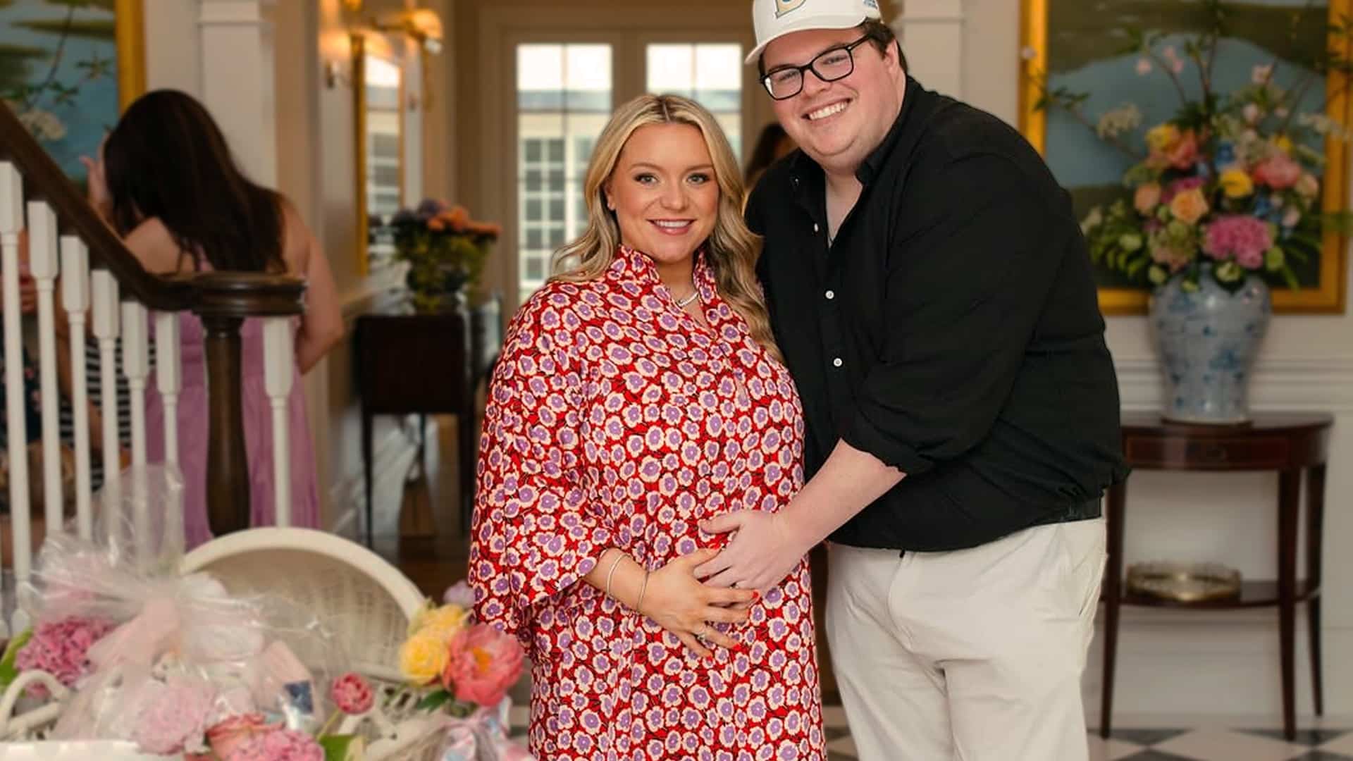 Stelen Covel and wife Haley smile at their baby shower as they prepare to welcome Toby Keith’s granddaughter.