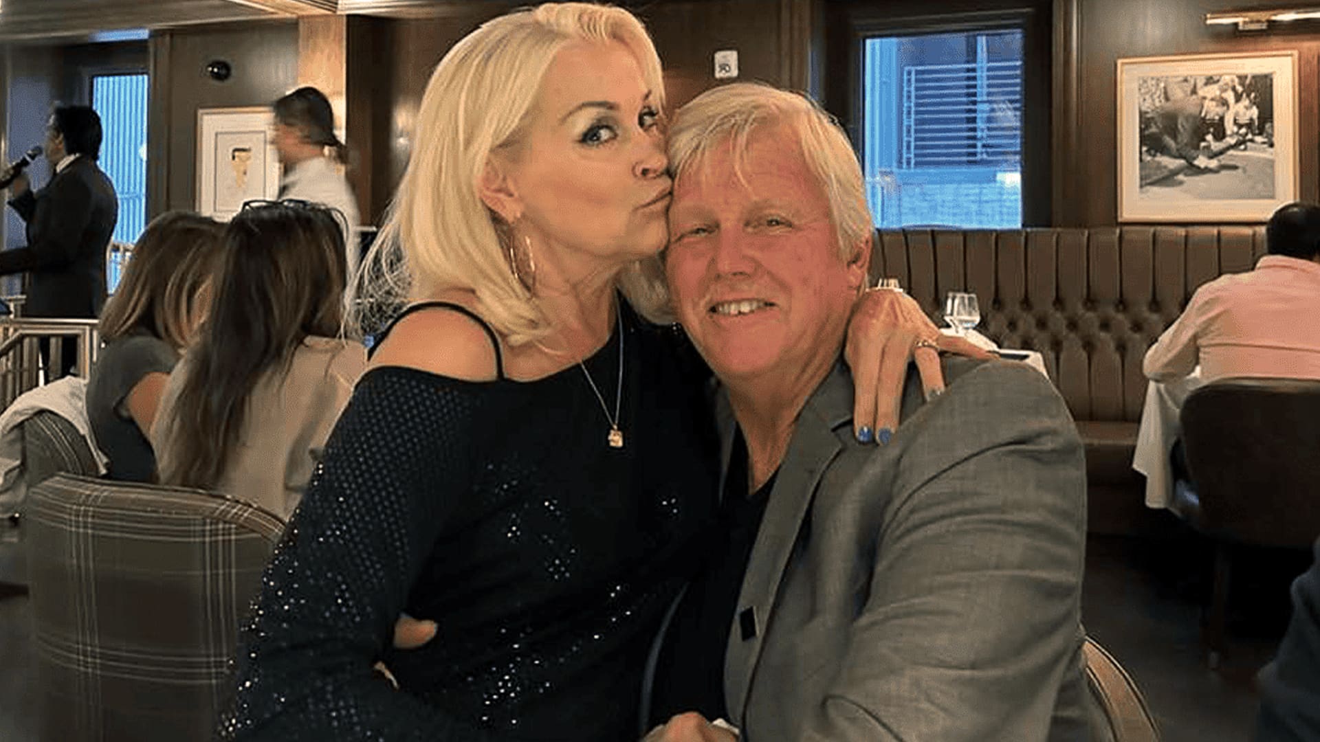 Lorrie Morgan kisses her husband Randy White on the cheek in a heartfelt photo taken before his passing, capturing a quiet love story that spanned 17 years.