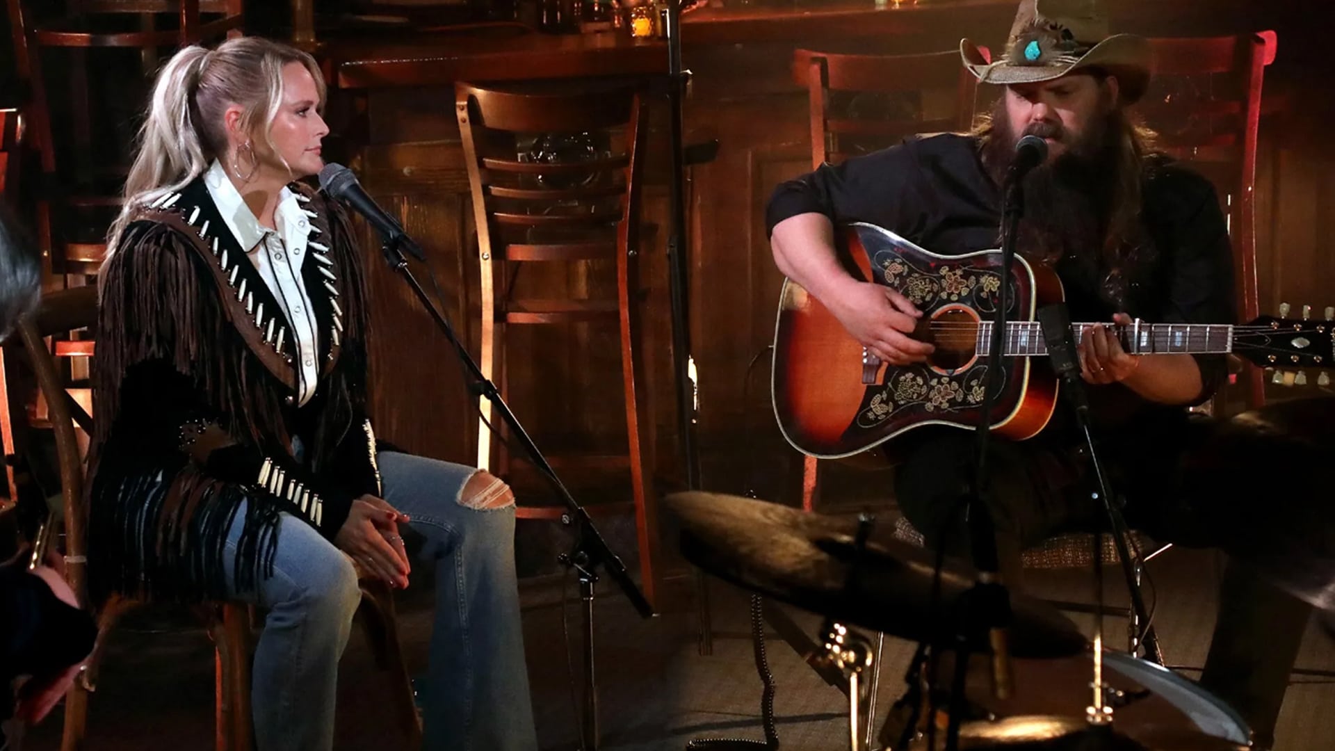 Miranda Lambert and Chris Stapleton perform together in a bar setting for their duet “A Song to Sing.