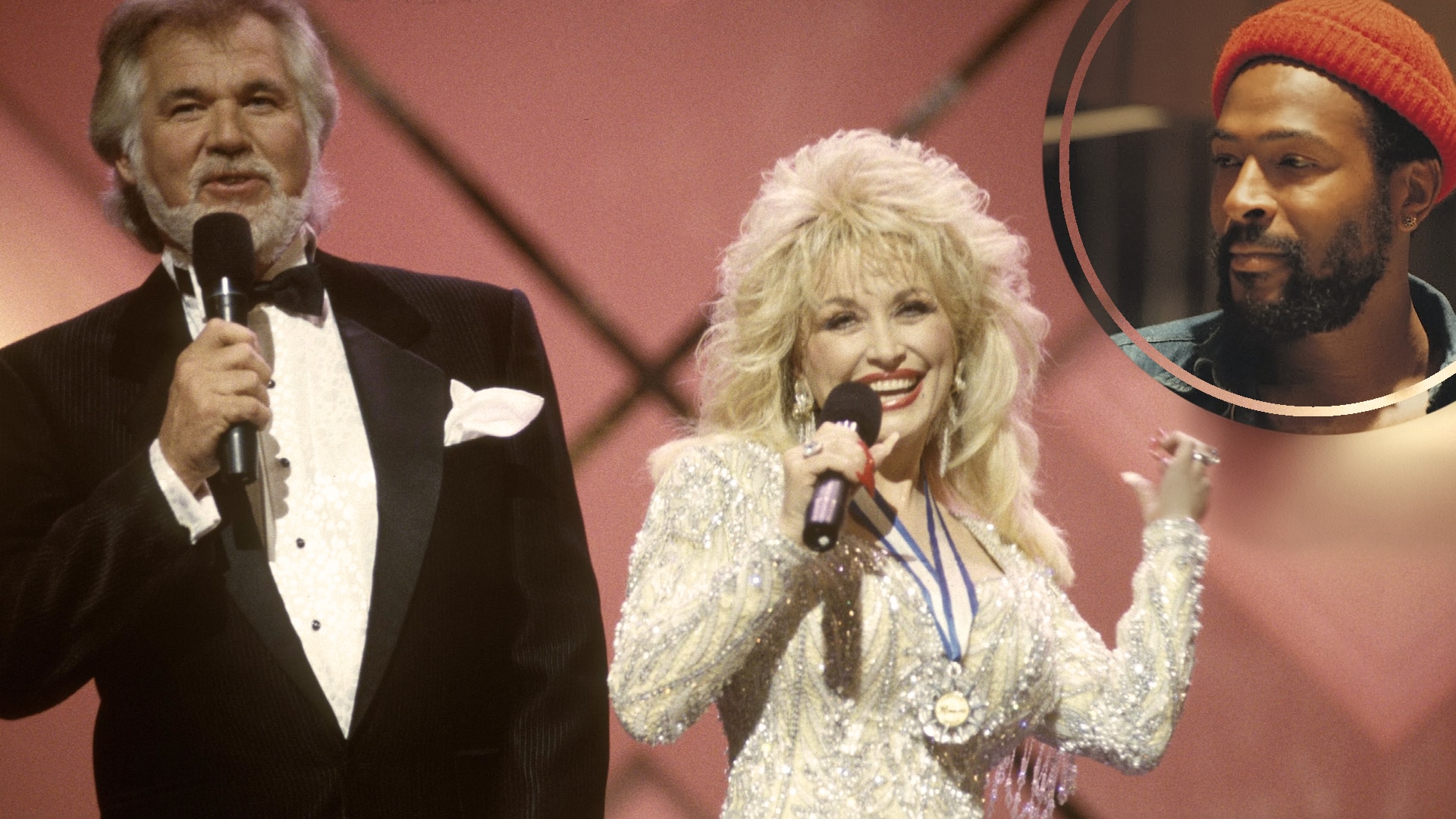 Dolly Parton and Kenny Rogers smile onstage singing their classic duet, which was originally written for Marvin Gaye.
