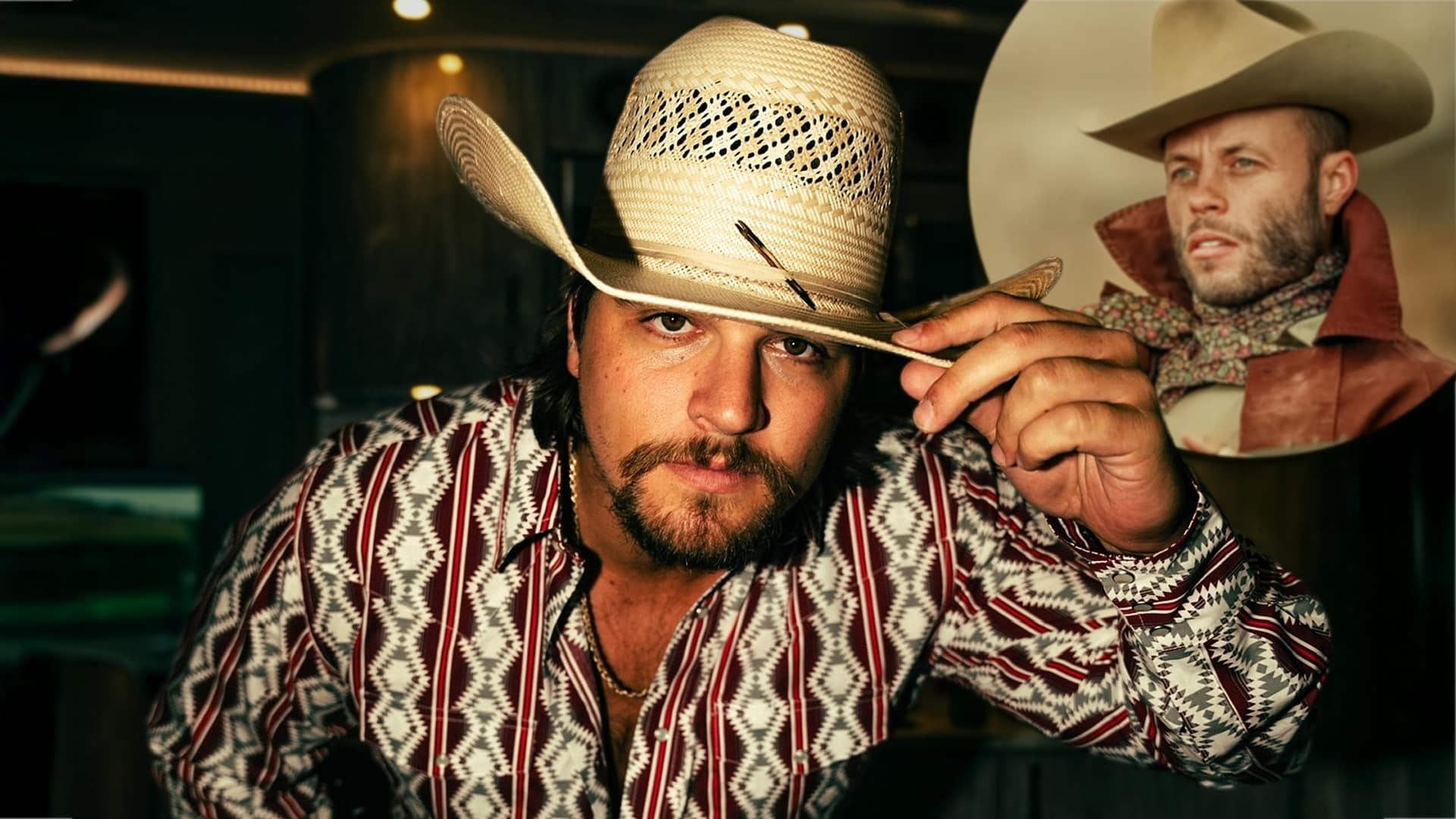 Gavin Adcock tipping his cowboy hat as Charley Crockett appears in the background, amid Adcock’s “cosplay cowboy” jab.