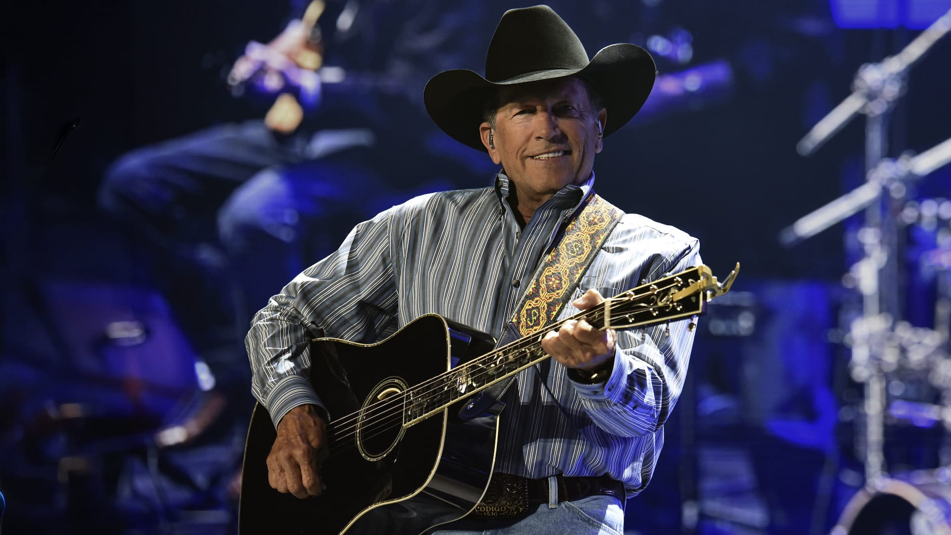 George Strait performing on stage with his guitar, ahead of being honored with the 2025 Kennedy Center Honors by President Donald Trump later this year.