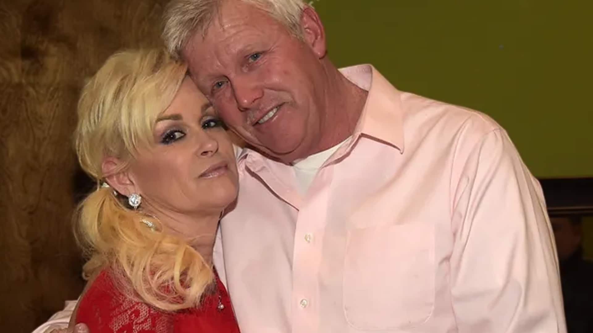 Lorrie Morgan and her late husband Randy White share a tender moment, reflecting the deep bond they had before his passing.
