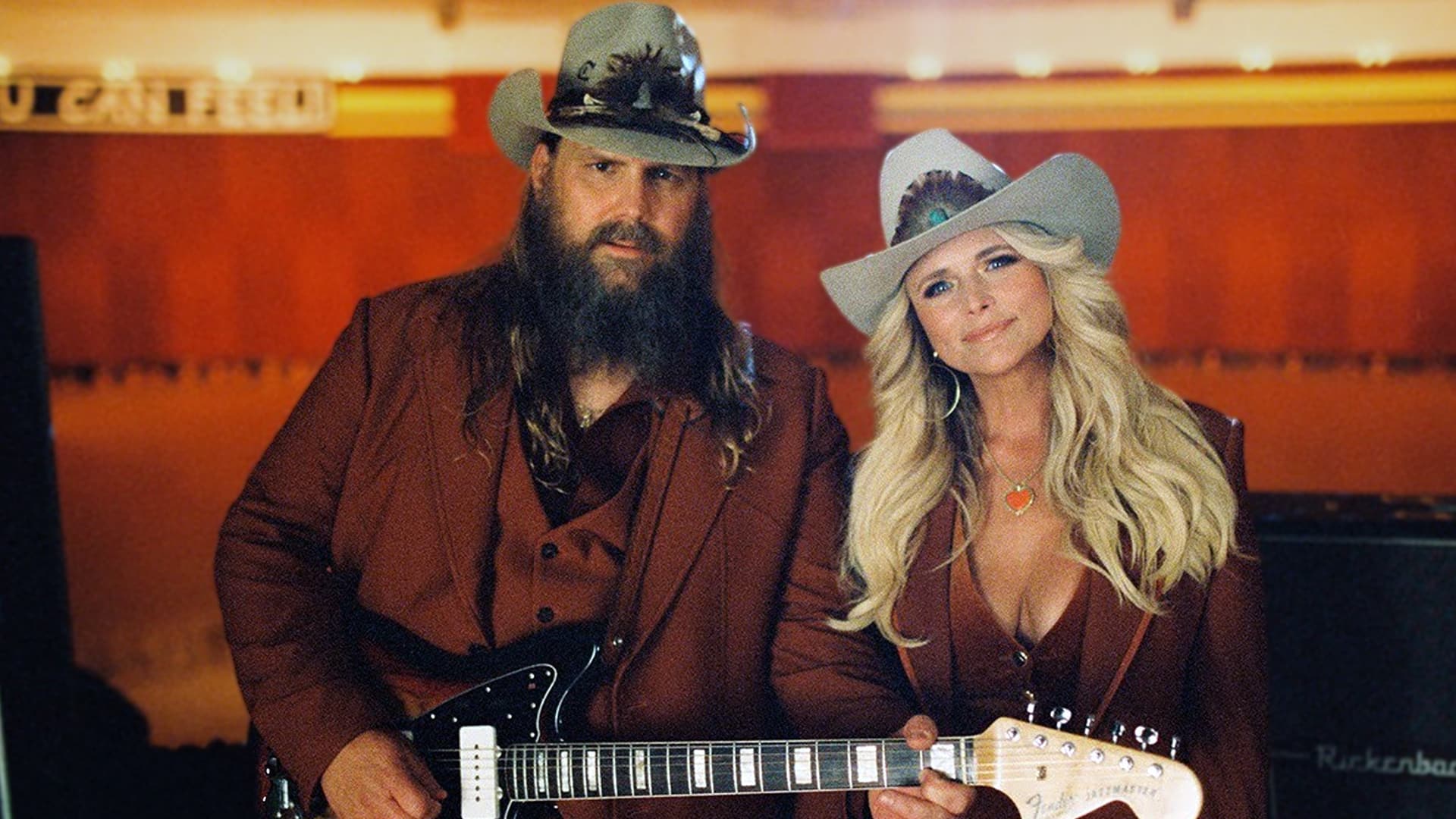 Miranda Lambert and Chris Stapleton with guitars in hand, evoking vintage country duets in their 1970s-inspired “A Song to Sing” music video.
