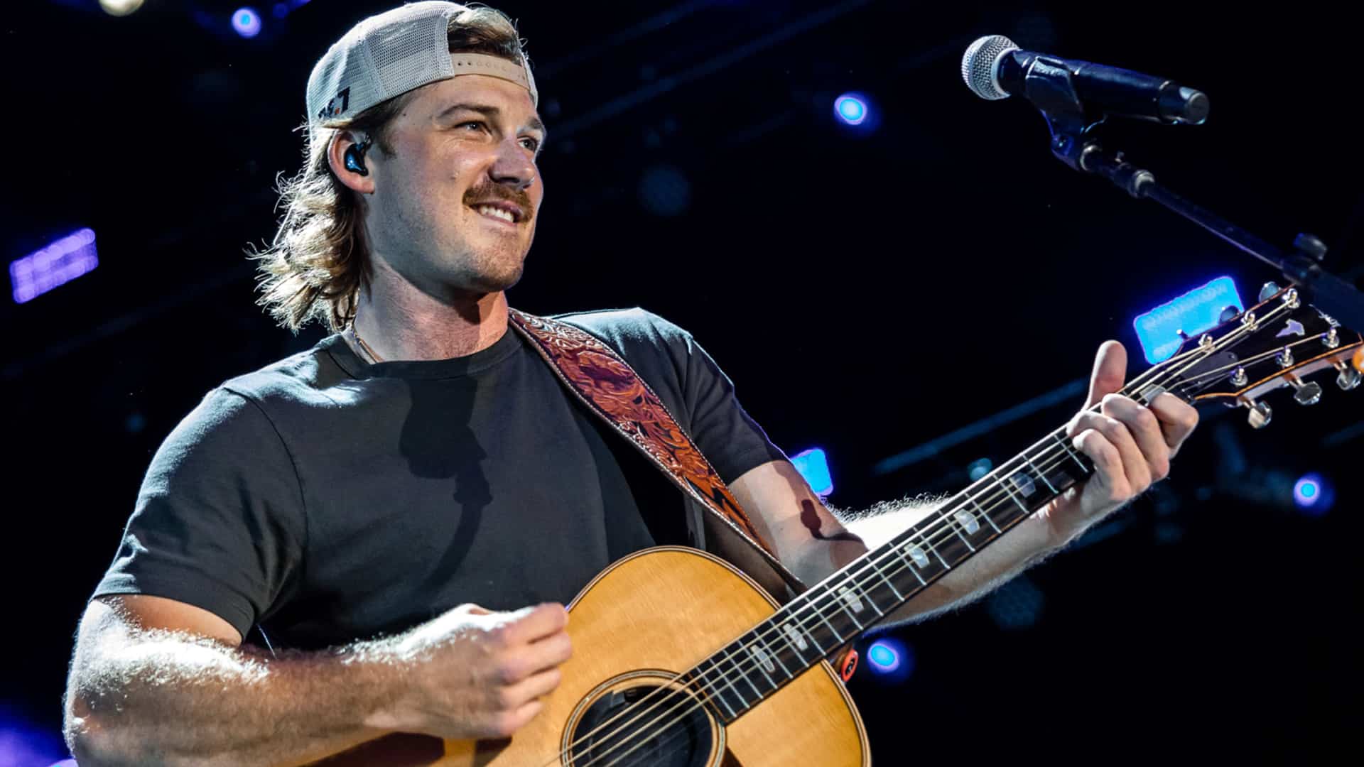 Morgan Wallen beams mid-performance, capturing the heartfelt moment he FaceTimed a young fan and reminded everyone why he’s country’s fan favorite.