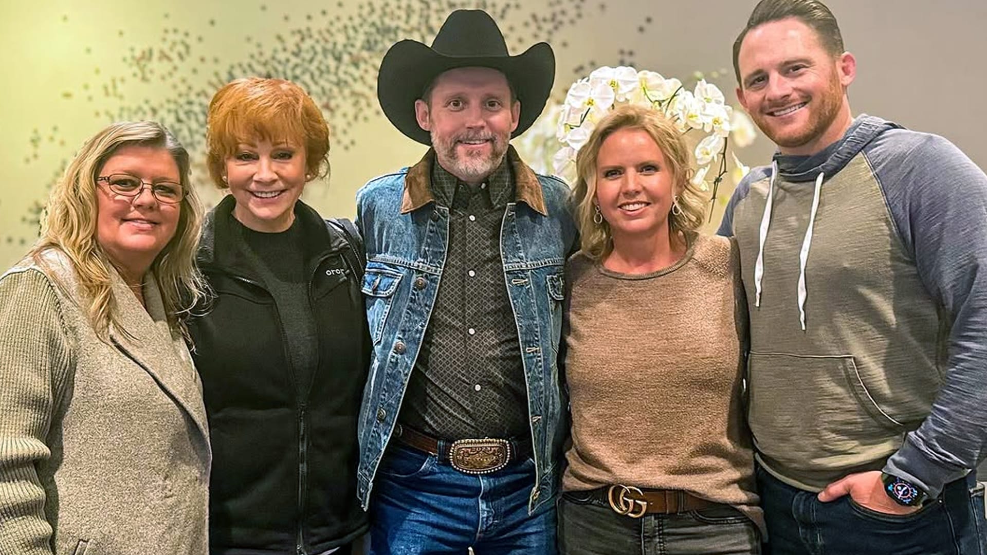 Reba McEntire and Rex Linn smile alongside Brandon Blackstock and family during a RodeoHouston outing, captured months before Blackstock’s death.