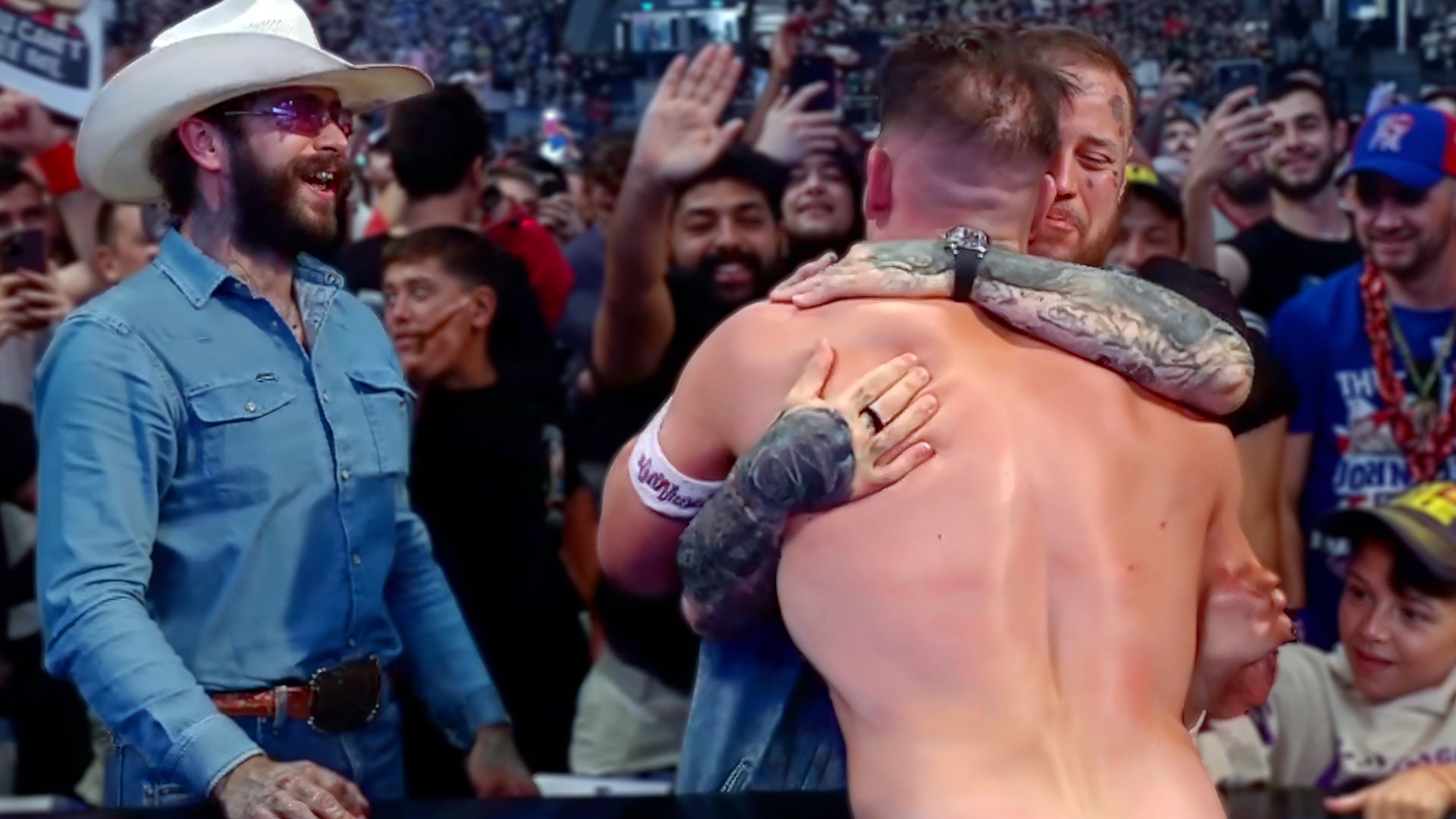 Jelly Roll hugs WWE legend John Cena ringside in Paris while Post Malone cheers on, marking a dream moment for the country star.