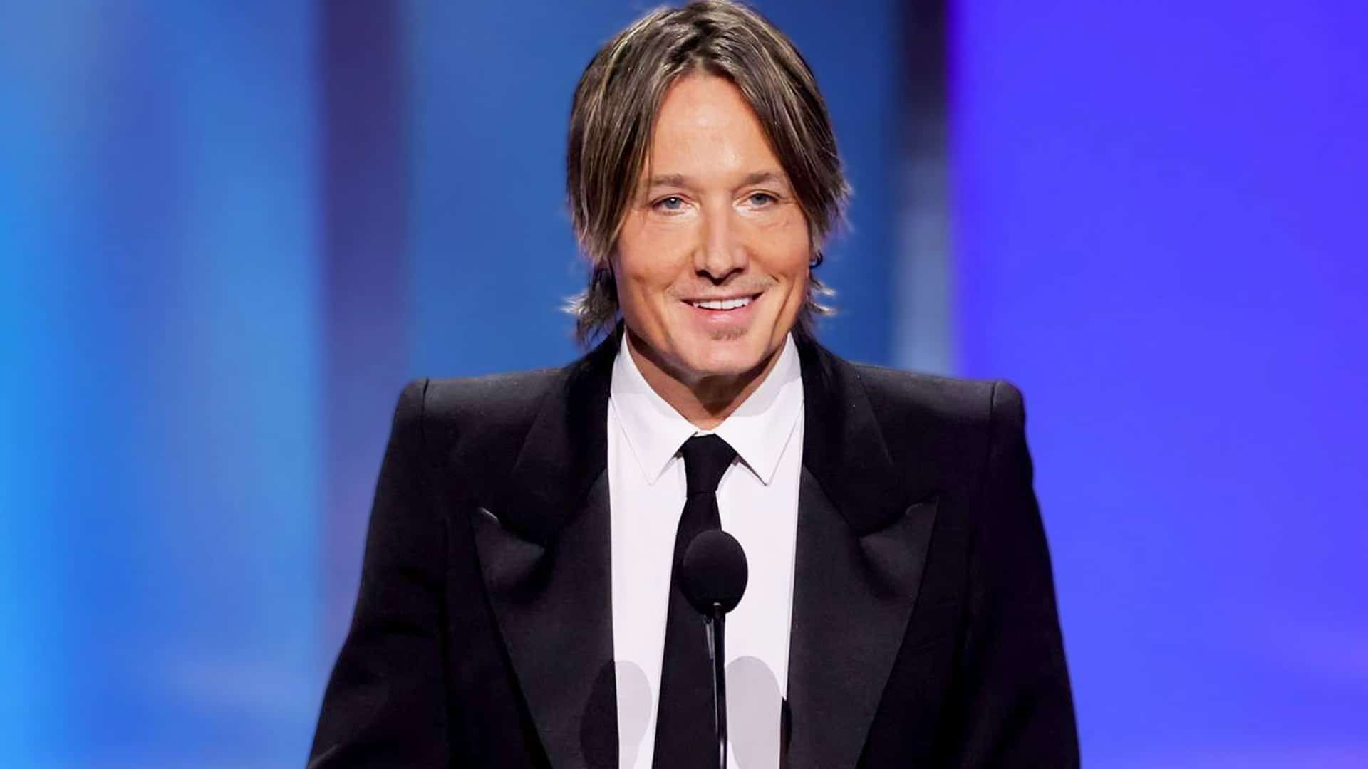 Keith Urban gives an emotional speech in a black suit, with his 2024 tribute to Nicole Kidman resurfacing after news of their separation.