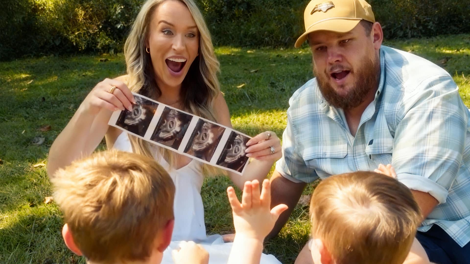 Nicole Combs holds ultrasound pictures as she and Luke Combs reveal their growing family with an emotional pregnancy announcement.