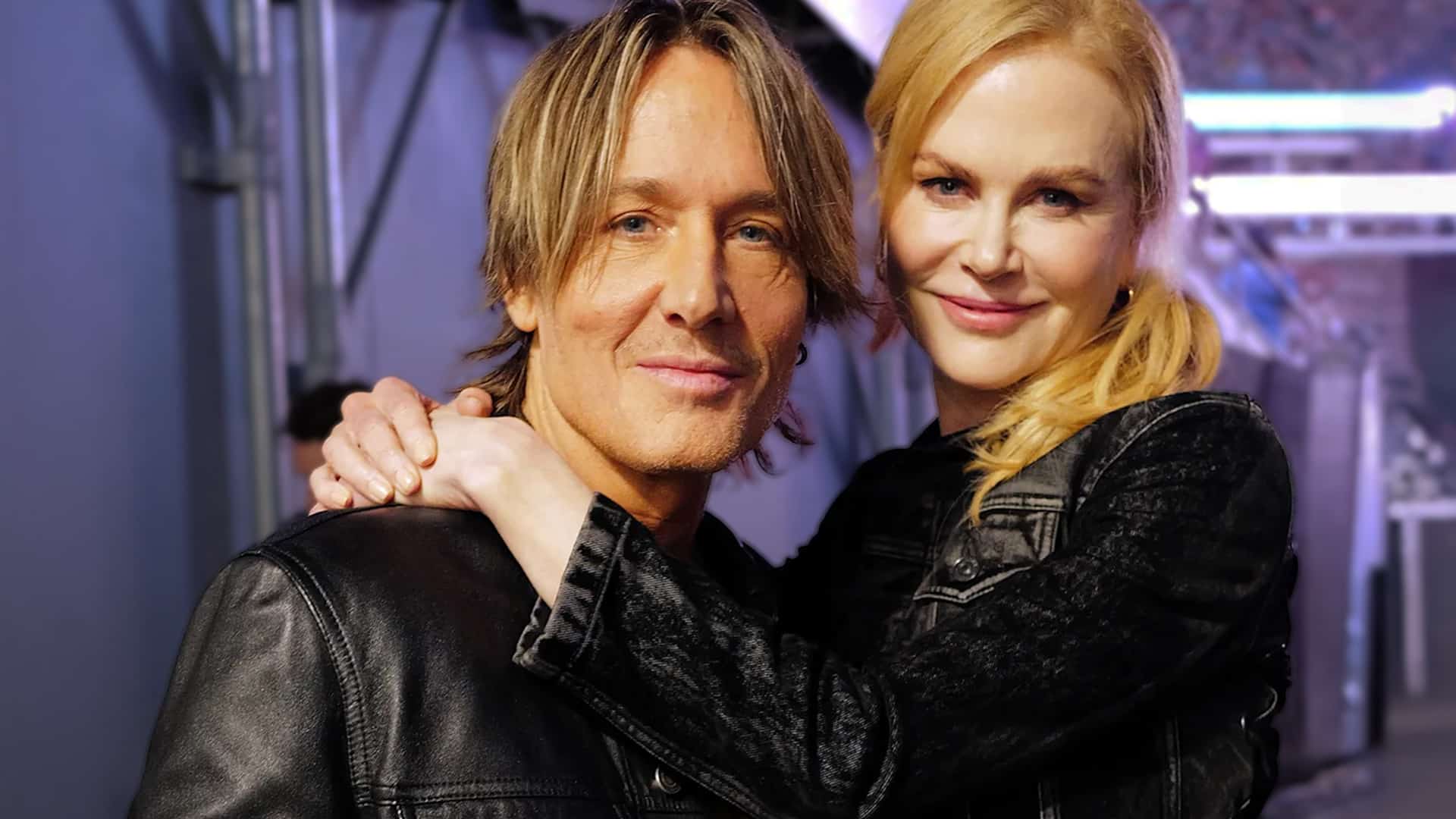Nicole Kidman embraces Keith Urban with a smile during happier times before reports of their separation.