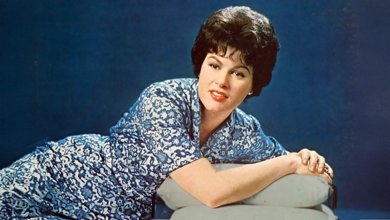 Country legend Patsy Cline posing in a vintage portrait, honoring the powerful voice born in 1932 that still inspires today.
