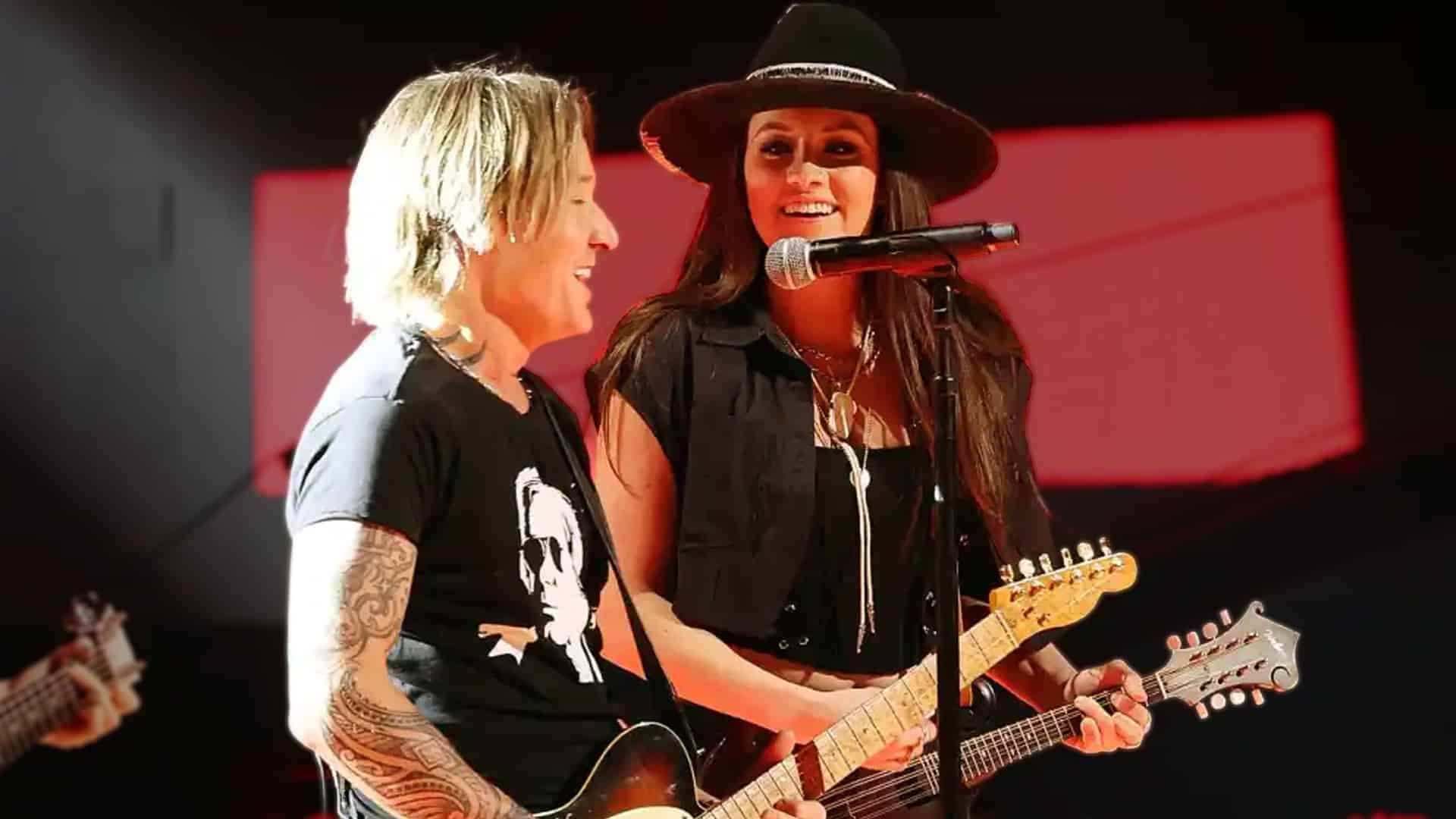 Keith Urban and guitarist Maggie Baugh performing together onstage, sharing an energetic moment as old interview clips about bandmate dating resurface.