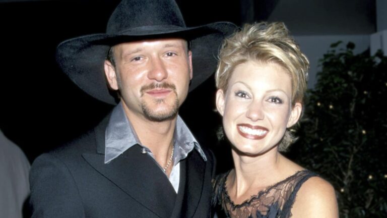 A young Tim McGraw and Faith Hill smiling together in a vintage photo, celebrating the love story that began with their 1996 wedding.