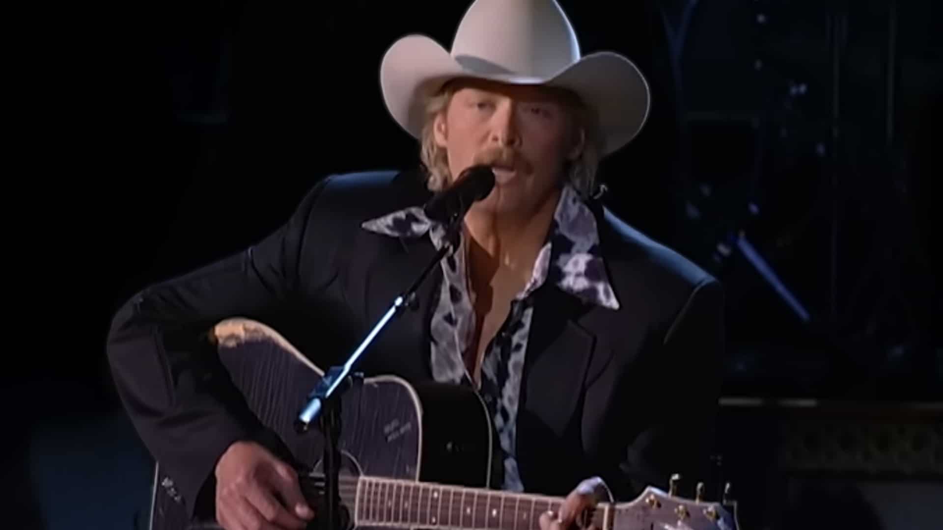 Alan Jackson performing Where Were You When the World Stopped Turning at 2001 CMA Awards emotional 9/11 tribute song debut.