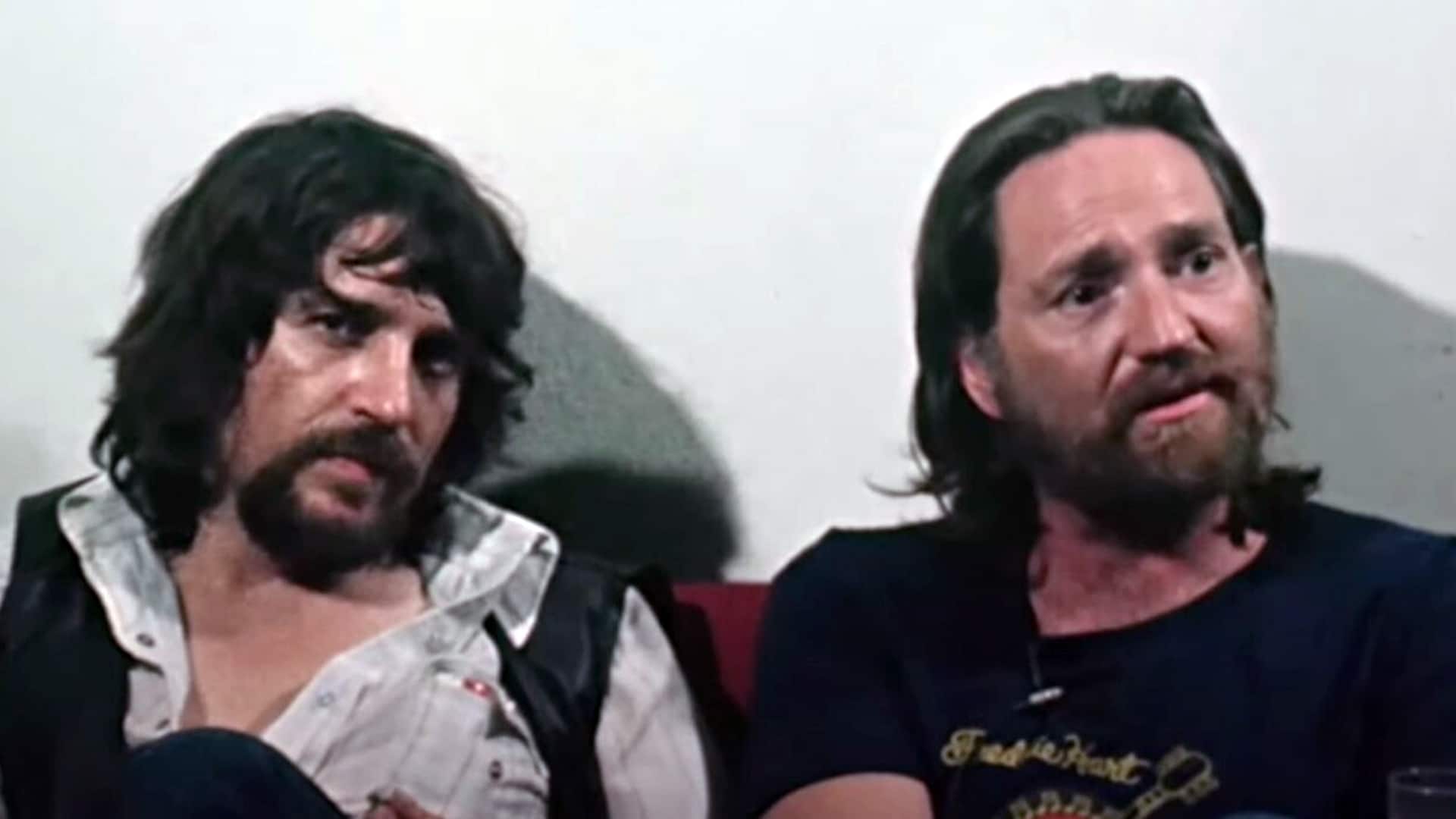 Vintage image of Waylon Jennings and Willie Nelson sitting together, a nod to the rare footage featured in the upcoming Waylon documentary.
