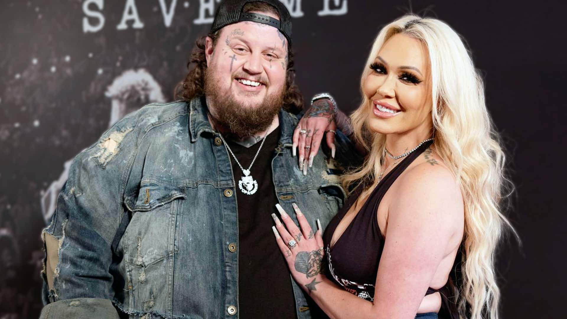 Jelly Roll and wife Bunnie Xo in an older photo together, as Jelly candidly reveals in a recent 2025 interview how losing over 200 pounds transformed his "horrible" pre-weight loss sex life and strengthened their marriage.