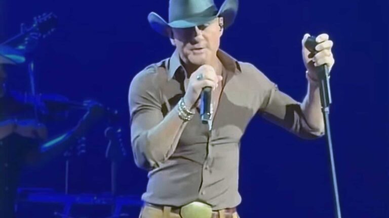 Tim McGraw performs at his 2025 Las Vegas residency in eye-catching tight suede fringe pants and cowboy hat, sparking viral online jokes and comparisons to Lainey Wilson's signature style during his Caesars Palace show.
