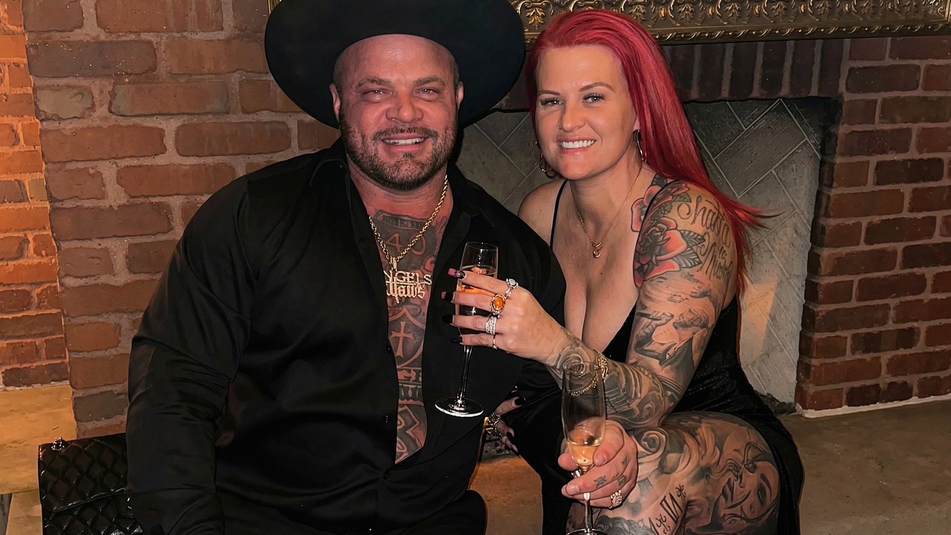 Struggle Jennings and wife Tabitha smile together while sharing a toast, celebrating their growing family as they prepare to welcome baby No. 8.