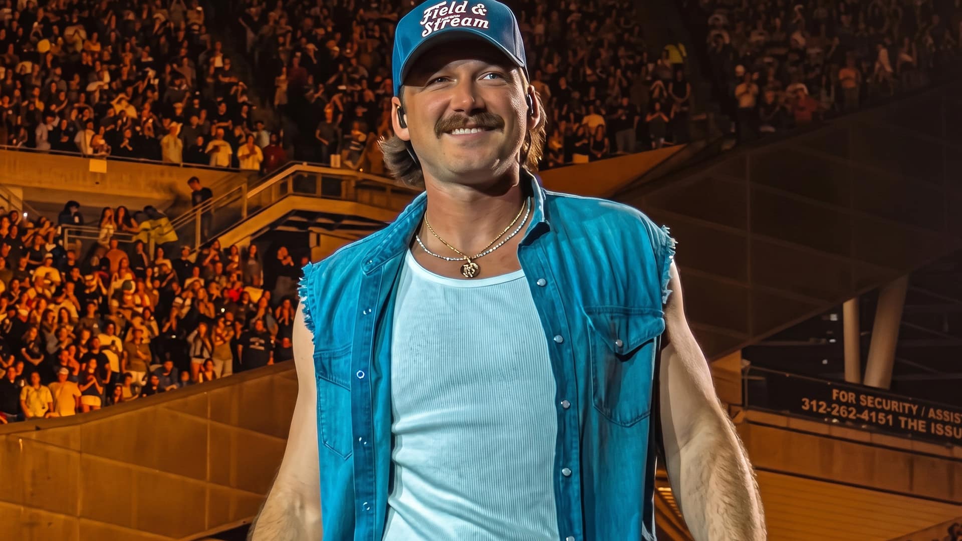 Morgan Wallen walking out alone onto the Soldier Field stage in Chicago, met by a roaring crowd of 60,000 fans on Saturday night.