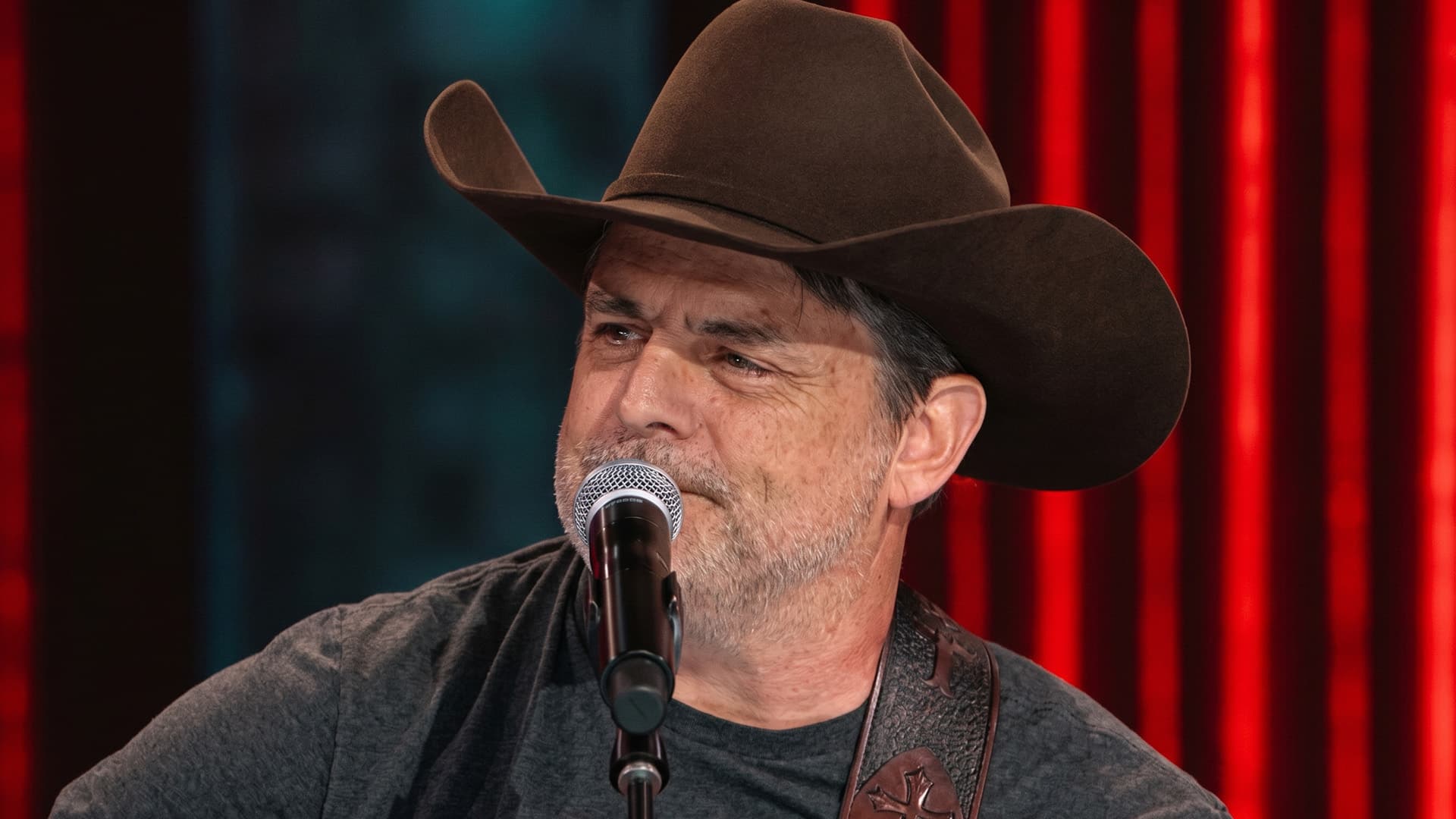 An emotional Rhett Akins on the Opry stage, finally getting his membership invitation.
