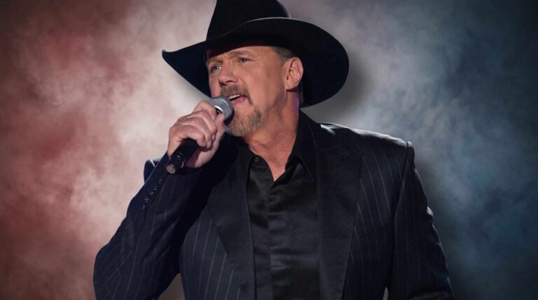 Trace Adkins singing patriotically into a microphone.