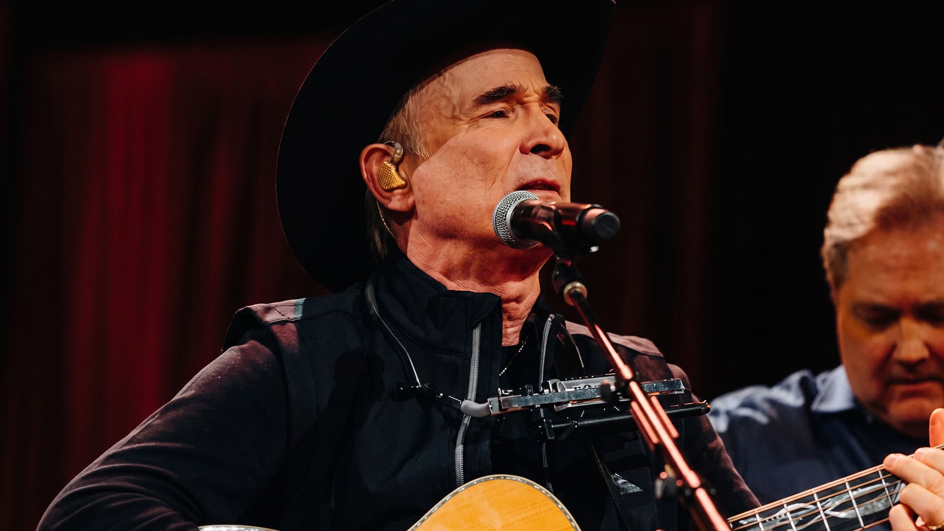 Clint Black on stage, before the hospitalization that forced him to cancel his July 3 show.