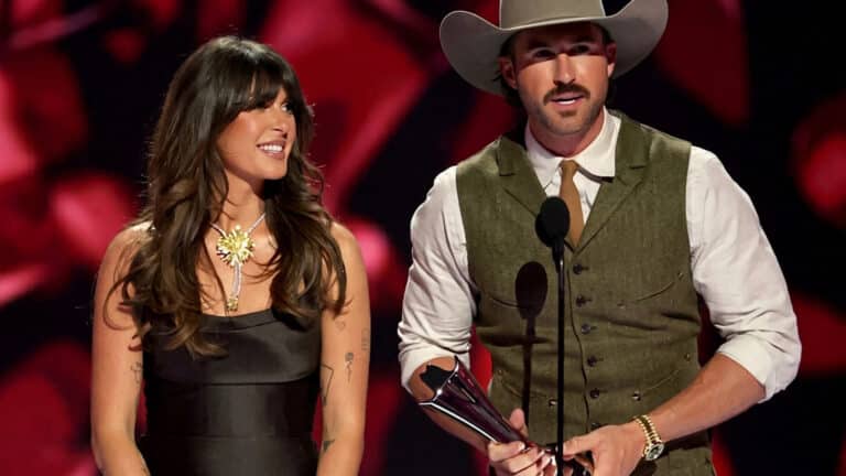 Ella Langley stands awkwardly with Riley Green on stage as she calls him out for taking credit for her success on The Voice.