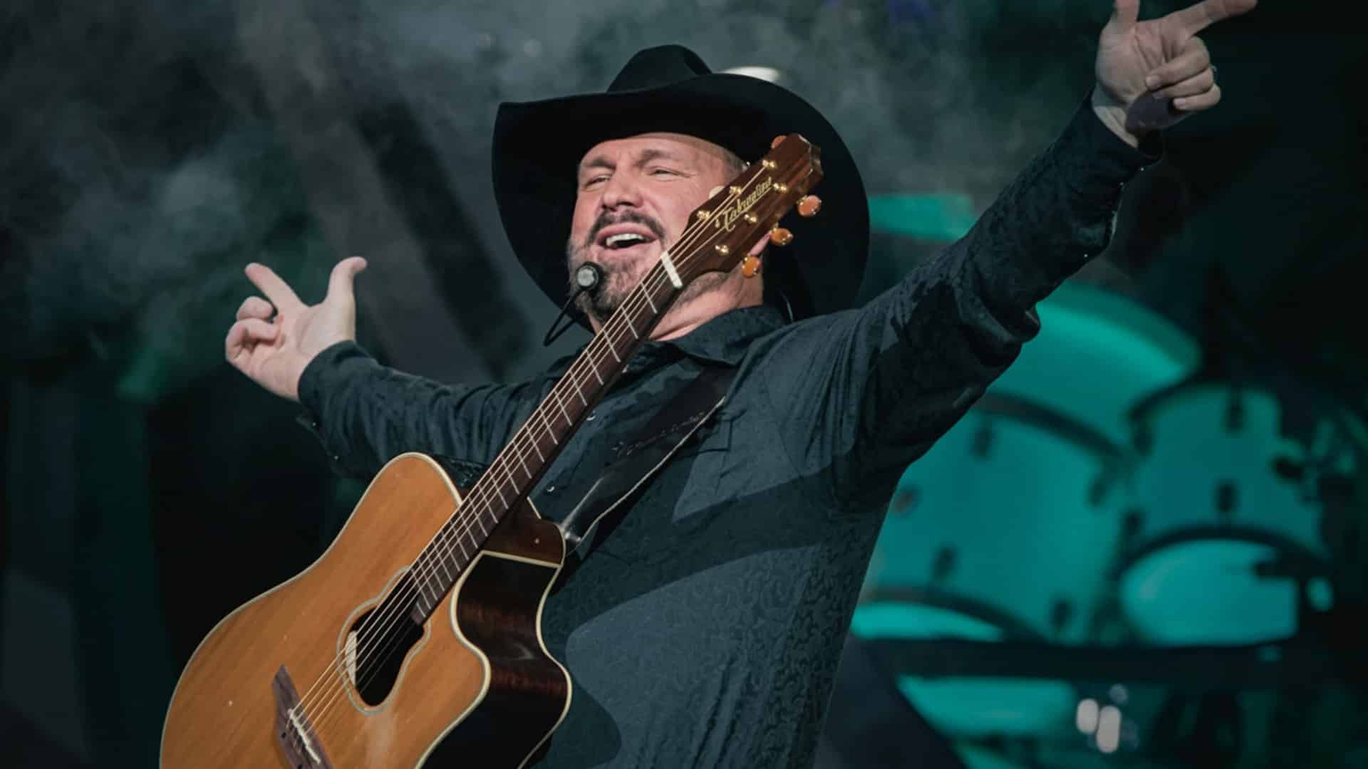 Garth Brooks performs on stage as he returns to Seattle five years after scrapping his Lumen Field show and says every seat is a great seat.