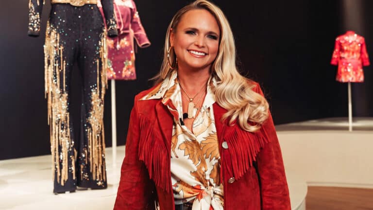 Miranda Lambert stands behind her velvet tour clothes as the Velvet Rodeo wardrobe lands at the Cowgirl Museum that inspired it and she calls it full circle.