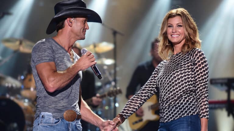 A photo of Tim McGraw and Faith Hill performing happily shows the couple who took home a Grammy while married for the song “Like We Never Loved at All.”